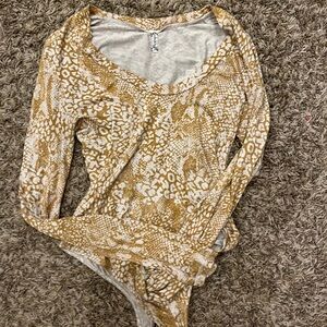 FP Movement by Free People Tan and White Bodysuit